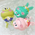Children's bath toys - Clockwork frogs that float and swim. 