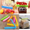pack of 12"Colorful Food Sealing Clip Set - Airtight Clips for Freshness | Perfect for Snack Bags, Frozen Foods, Pantry Storage - 5-Piece Set | Free & Fast Delivery | I&S Store". 