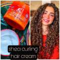 Roushan Shea Butter Curling Cream. 