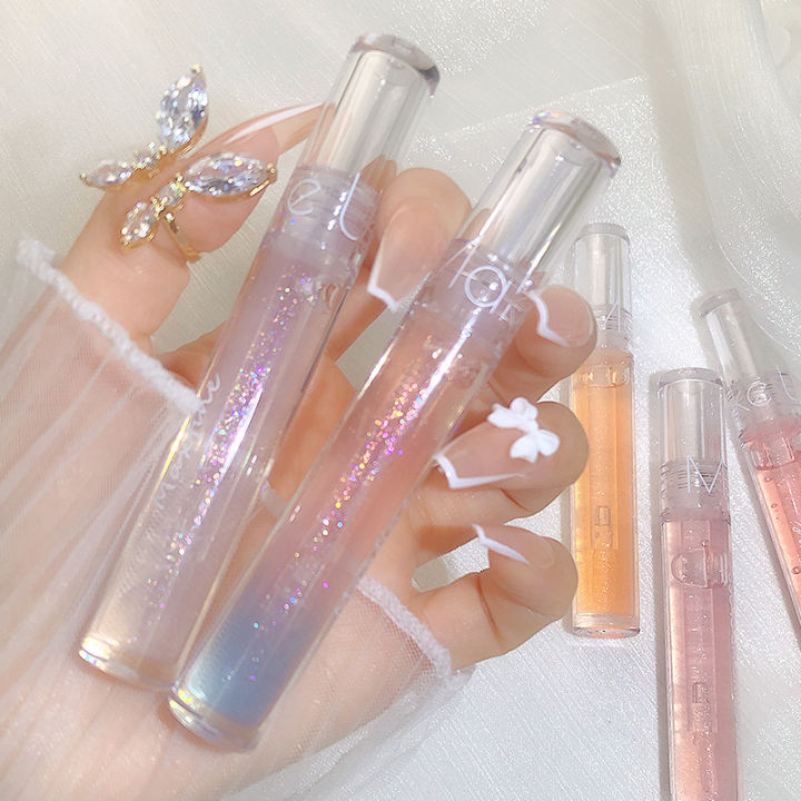 Water%20Glow%20Lip%20gloss%20keeps%20the%20lips%20moist%20plump%20and%20lustrous%20maintaining%20a%20natural%20makeup%20color%20-%20Image%202