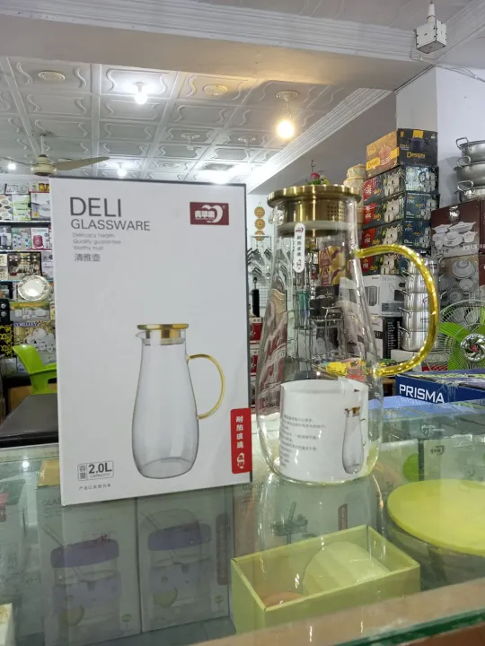 Deli%20Glassware%20High%20Quality%20Light%20Weight%202L%20Glass%20Water%20Jug%20With%20Stylish%20Steal%20Lid.%20Brosilicate%20Fancy%20Glass%20Water%20Jug%20For%20Juices.%20-%20Image%202