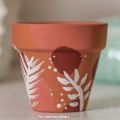 painted clay plant pot. 