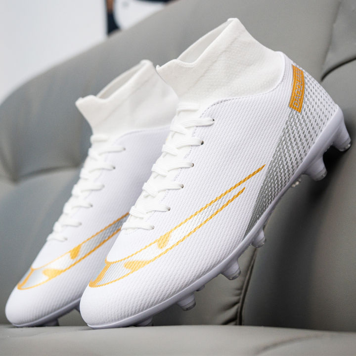 Premium%20high-top%20football%20shoes%20FG%20long%20studs%20and%20TF%20short%20studs,%20suitable%20for%20both%20men%20and%20women,%20offer%20comfort.%20Sole%20spikes%20-%20Image%205