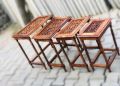 Wooden crafted Nested 4 table set. 