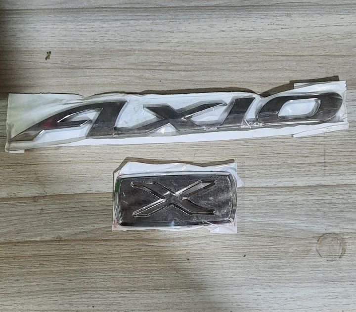 1 x Axio Logo 1 x X Logo For Toyota Axio Car Back Trunk | Daraz.pk