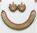 Maroon colour jewellery set of round crystal earrings and chowker neckless in maroon colour for girls and women for wedding party and eid in low price. 