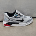 PremiumBlack & White Sports Sneakers For Men – Lightweight Breathable Lace-Up Casual Shoes with Anti-Odor Technology. 