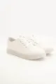Plain White Sneakers for Women – High-Quality and Versatile. 