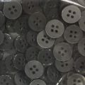 4-hole 100-piece buttons pack grey flat. 