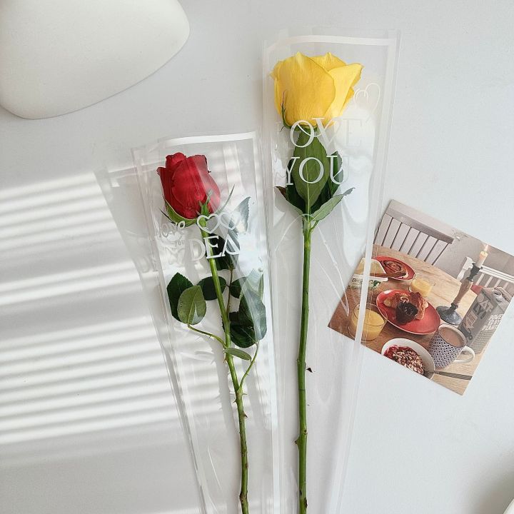 50pcspcs%20LOVE%20Transparent%20Rose%20Packaging%20Bags%20Flower%20Bouquet%20Plastic%20Bag%20Bouquet%20Wrapping%20Paper%20One%20Straight%20Bag%20Flower%20Packagin%20-%20Image%203