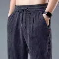 Summer Nine-minute Pants Ultra-thin Section Ice Silk Cool Trend Loose Cotton Linen Casual Pants Straight Linen Pants Men Summer. 