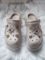 Beautiful Cream Fancy Design Crocs For Women. 