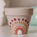 painted clay plant pot. 