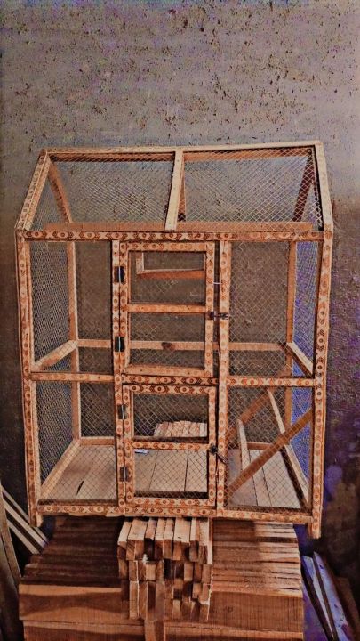Wooden bird larg size big cage canaries and other small birds. haviey wood parits ni khay gy. Haviey net gali . beauty cage for home corner and enjoy. hight 3ft lenth 32inch werth 18 inch.