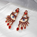 A Fashionable and Creative Red Devil's Eye Red Earrings. 