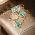 CHINA IMPORTED Necklace Jewelry Women's New Ball Necklace Earrings Ring New Titanium Alloy suit All-match High-end Clavicle Chain Accessories.