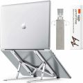 Foldable Adaptable Laptop Stand Foldable Ventilated Cooling stand Portable Aluminum Laptop Riser Desk Laptop Holder with Non-Slip Rubber Grip Portable foldable adjustable & compatible with all laptop sizes silver & black color available size 9.1* 6.1*6.1. 