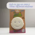 Free dual-sided scrubber + sponge (Scrub Daddy®) White smile face sponge. 