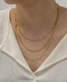 Gold layered chain necklace. 
