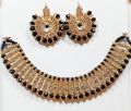 Maroon colour jewellery set of round crystal earrings and chowker neckless in maroon colour for girls and women for wedding party and eid in low price. 
