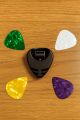 4 Pcs Guitar Picks Plus Pick Holder Combo. 