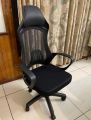 Sytas Executive Leather Office Chair, Comfy Desk Chair with Adjustable Headrest & Flip-up Padded Arms & Lumbar Support, Adjustable Hight and Tilt, Rolling Swivel Chair, Black. 