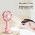Portable mini rechargeable travel fan for indoor and outdoor use.