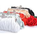 Fashionable and Vintage Ruched Satin Clutch Hand Bag with Silver Floral Clasp. 