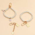 Vintage Korean Fashion Pearl Keychain Women Girl Gold Metal Chain Key Ring. 