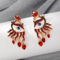 A Fashionable and Creative Red Devil's Eye Red Earrings. 