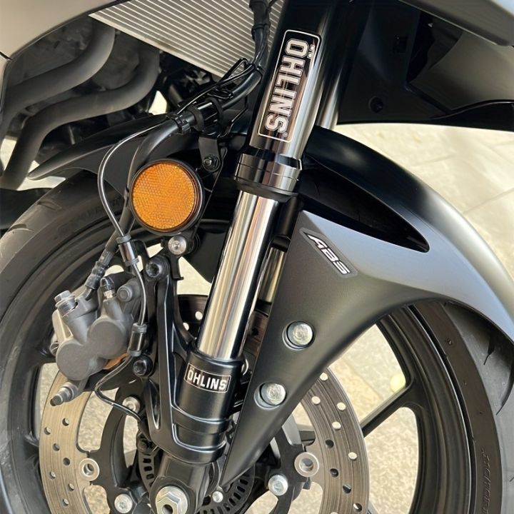 Ohlins%20Suspension%20Shocker%20Damper%20Motorcycle%20Decals%20-%20Transparent%20Adhesive%20Stickers%20with%20Warning%20Labels%20for%20Enhanced%20Performance%20-%20Image%206