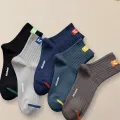 5 Pairs Fashionable Versatile Men Mid Length Socks With Trendy Letters Comfortable Soft Lightweight Breathable Casual Socks. 
