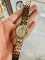 Cartier (ladies watch). 
