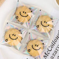 100pcs Cute Smiling Face Cookie Packaging Bag Laser Transparent Biscuit Bag Self-adhesive Bag Birthday Party Wedding Decoration.