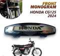 FRONT MONOGRAME AND REFLECTOR HONDA 125,unique,super star ،super power  UNIVERSAL FITTING USE IN ALL BIKES GOLDEN SHADE 70cc+125cc. 