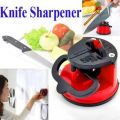 Knife sharpener with suction pad. 