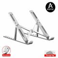 Foldable Adaptable Laptop Stand Foldable Ventilated Cooling stand Portable Aluminum Laptop Riser Desk Laptop Holder with Non-Slip Rubber Grip Portable foldable adjustable & compatible with all laptop sizes silver & black color available size 9.1* 6.1*6.1. 