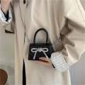 Mini trending bow bag. 
