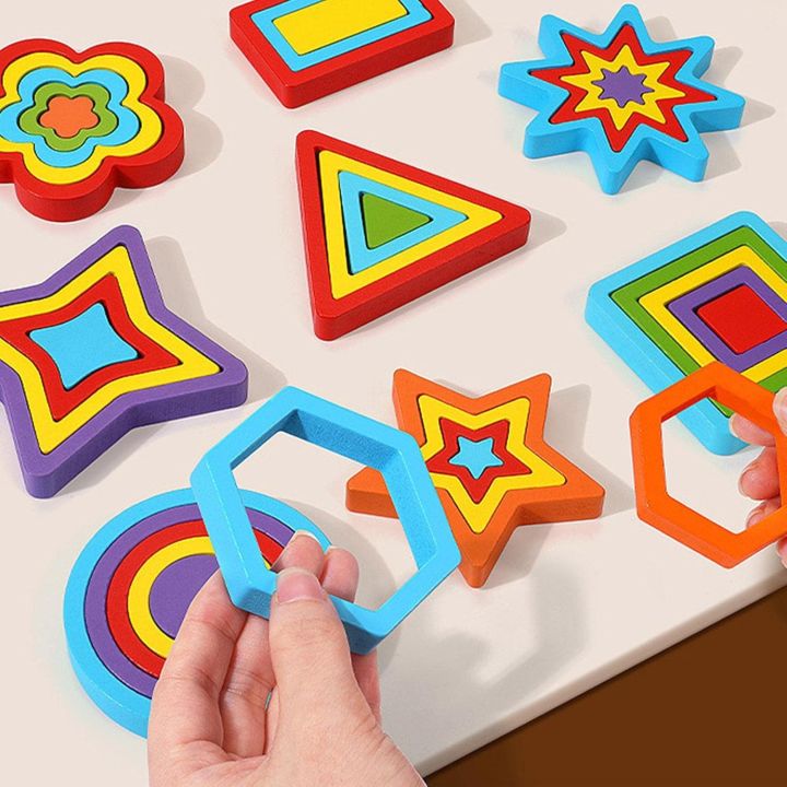 Wooden%20Shapes%20Puzzle%20Learning%20Toy,%20Montessori%20Brain%20Teaser%20Puzzle%20Board%20with%209%20Geometric%20Shapes,%20Interactive%20Game%20Educational%20Toys%20for%20Kids,%20Multicolour,%203+%20Years%20-%20Image%203