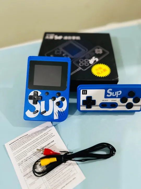 Sup%20Game%20%20400%20games%20in%201%20dual%20player%20game%20Handheld%20Video%20Game%20Console%20with%20Remote,%20Retro%20Mini%20Game%20with%20400%20Classic%20Sup%20Game%20TV%20Compatible%20for%20Kids,%20Rechargeable%208%20Bit%20Classic%20Color%20May%20Very%20-%20Image%203