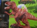 Interactive Orange Dinosaur Toy with Light-Up Spikes and Realistic Roaring Sounds. 