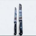 Black handle knife with cover for home and multipurpose use. 