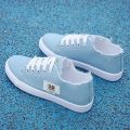 2025 Spring New Style Comfortable Casual Flat White Shoes Canvas Low-top Cross-strap Lightweight Sports Shoes for Women. 