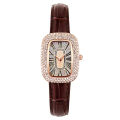 Women's Analog Watch with Diamond Studded Bezel and Black Leather Strap. 