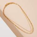 Gold layered chain necklace. 