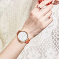 TOMI Women's Minimalist Style Leather Watch Women's Small Disc Scaleless Fashion Watch Minimalist Women's Leisure Quartz Watch. 