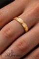 Stainless Steel Golden coloured trendy design finger ring.