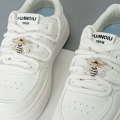 A Pair of Detachable Cute Little Bee-Style White-Winged Shoes with Glittery Decorations on the Laces and the Buckle.. 