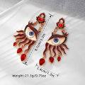 A Fashionable and Creative Red Devil's Eye Red Earrings. 