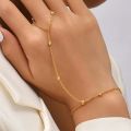 Stainless Steel All-Season Minimalist Hand Harness Bracelet for Women – Elegant Chain with Attached Finger Ring & Adjustable Fit. 